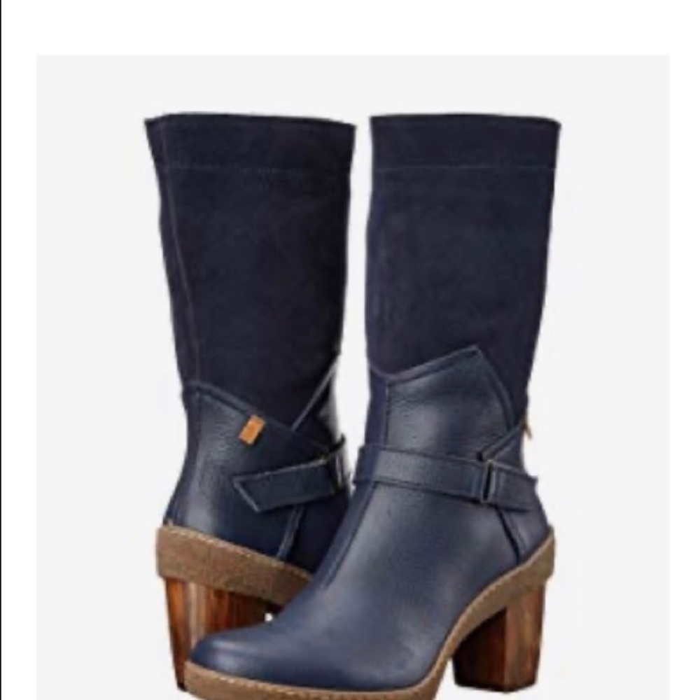 Mid Calf Navy boot with heel. Almost new!